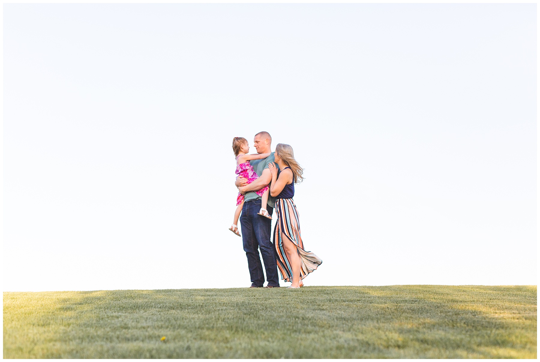 family standing on a hill in Meridian Idaho