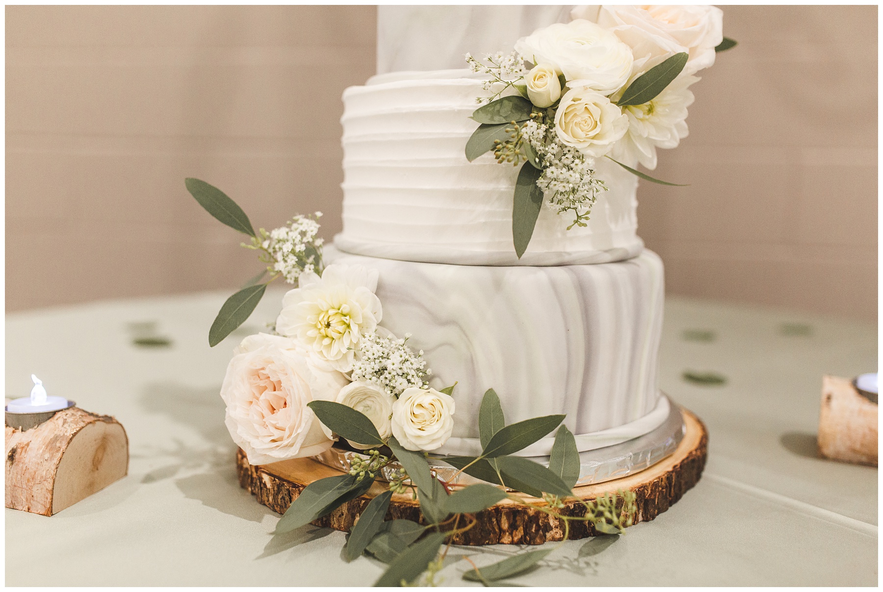Gray marble wedding cake at reception in Boise Idaho