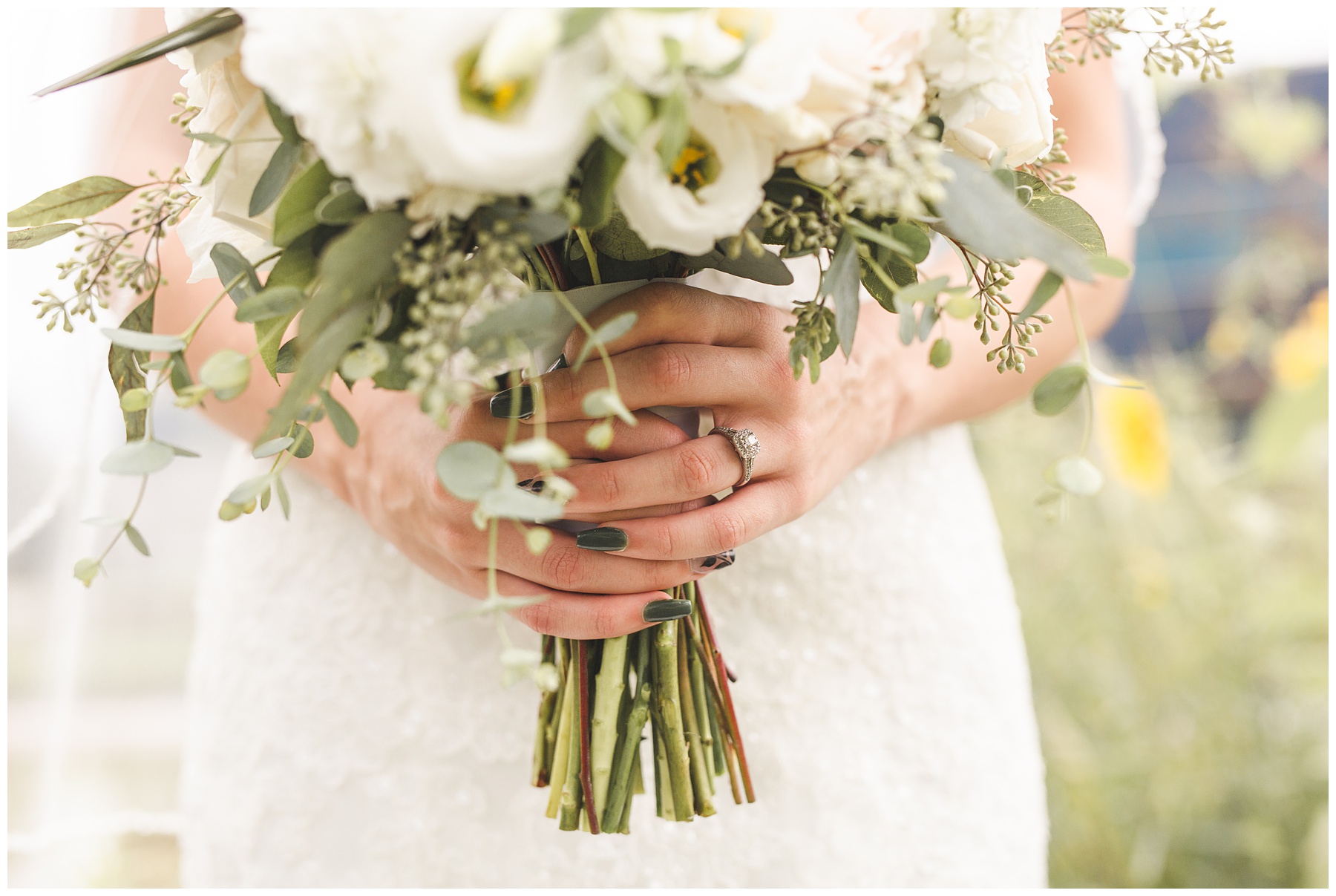 Bride holding bouquet with green manicure in Meridian Idaho