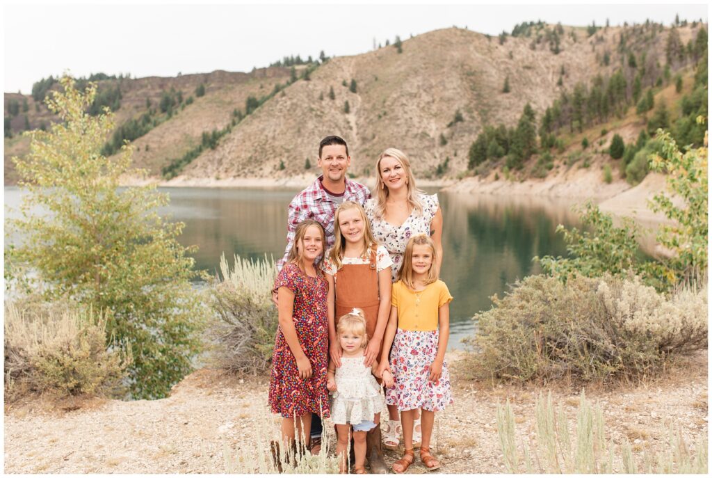 Sunset Session at Anderson Dam family smiling and looking at the camera in Boise Idaho Miranda Renee Photography