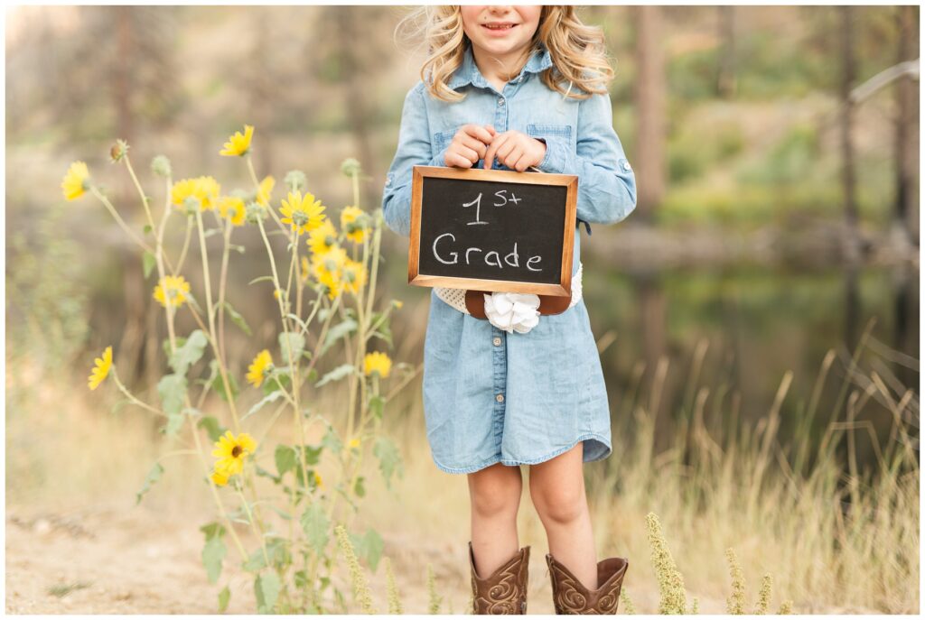 daughter in denim dress starting first grade picture