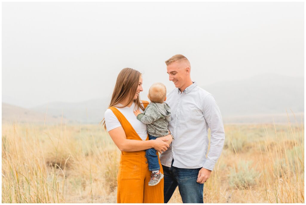 Mother and father looking at son in Boise Idaho, Miranda Renee Photography