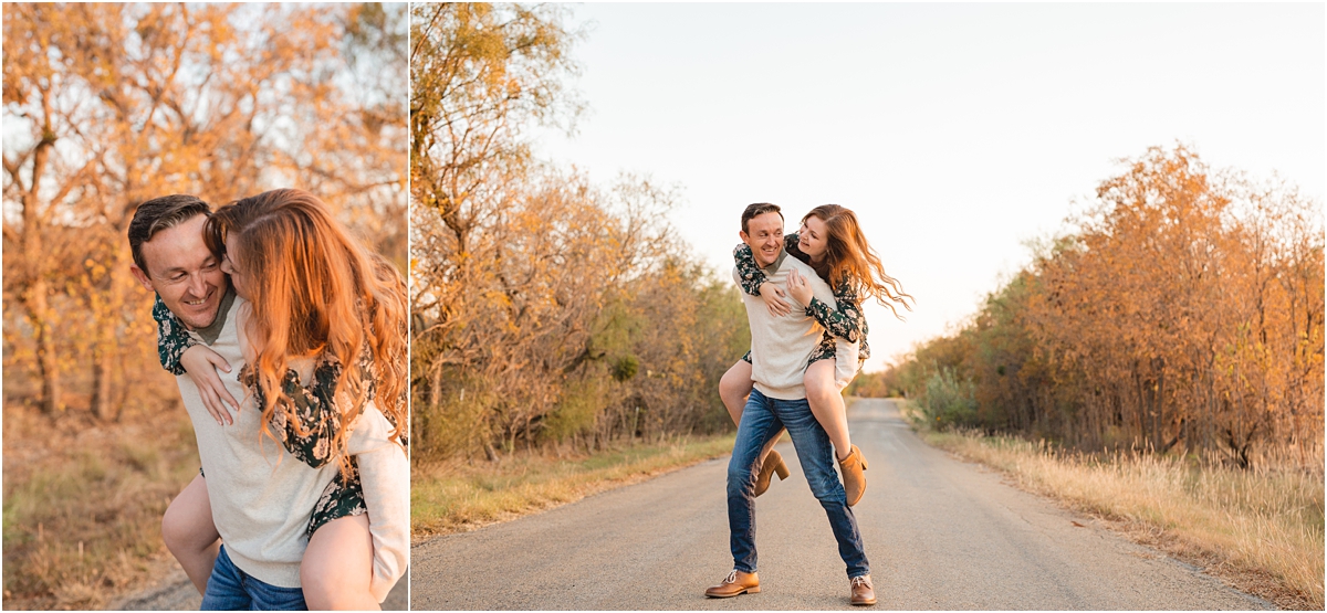 Couple piggy back ride with fall leaves in the background. Idaho wedding photographer Miranda Renee Photography