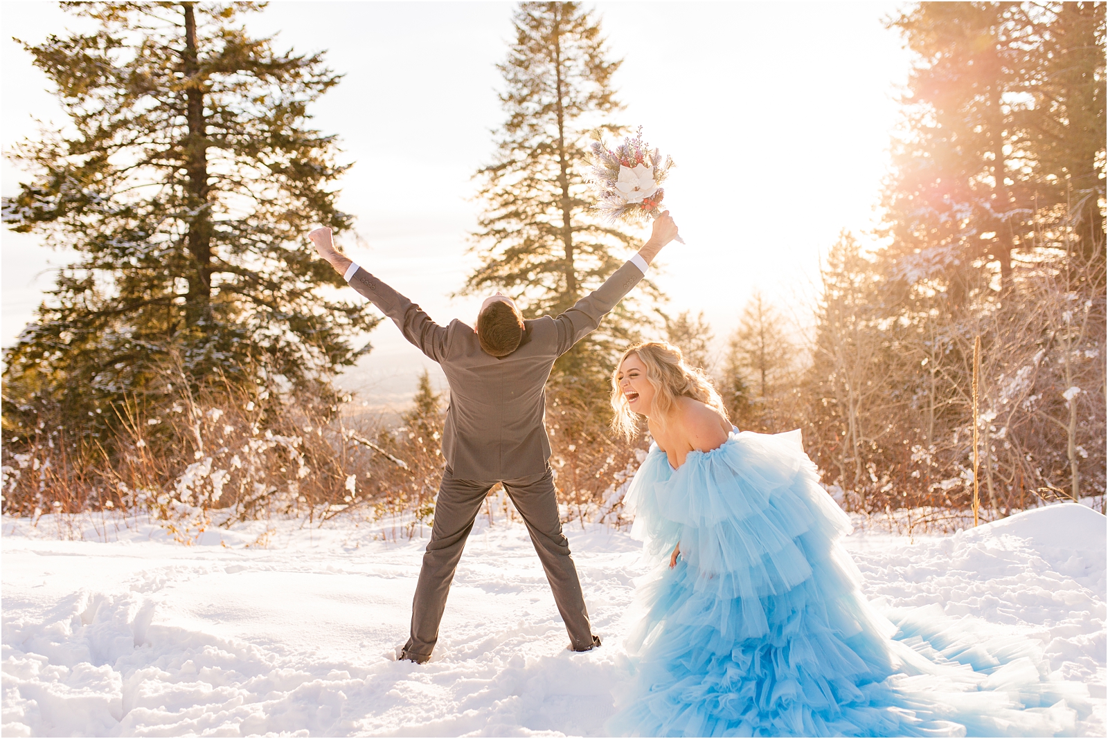 groom very excited to have married bride Winter Wedding in Idaho