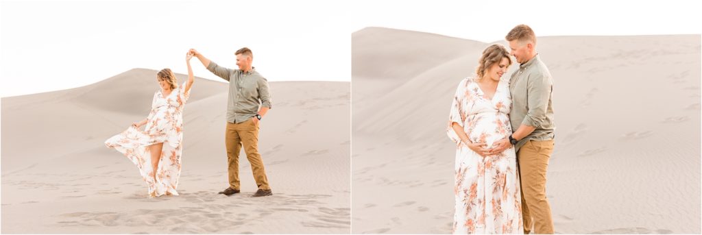 couple in ivory, sage, and caramel dancing on the sand dunes