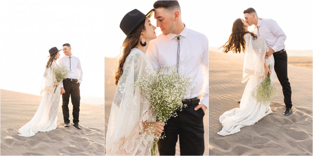 couple dressed in boho clothes for their elopement on the sand dunes