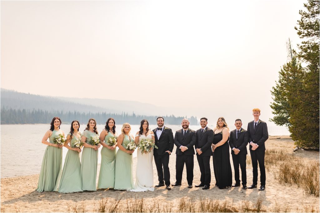 wedding party in sage, ivory, and black