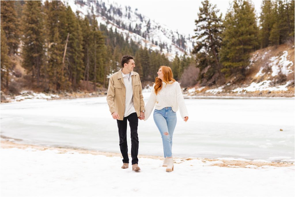 couple in front of snowy mountain in Banks Idaho