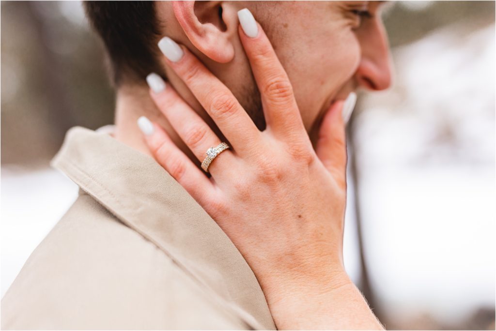 up close photo of engagement ring on man's face photo by miranda renee photography