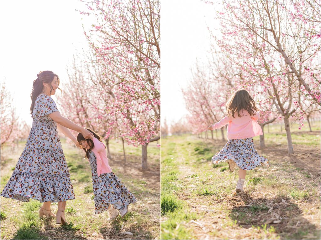 mom spinning daughter for family photos