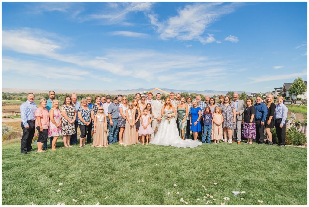 large family photo at wedding