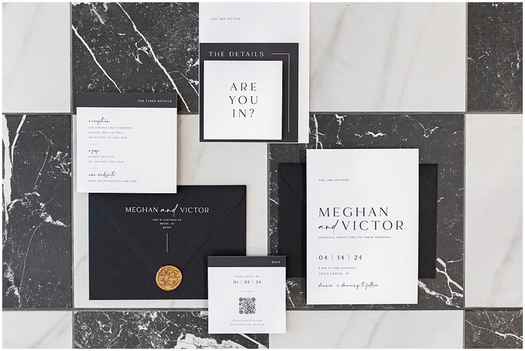 black and white marble invitation suite flatlay