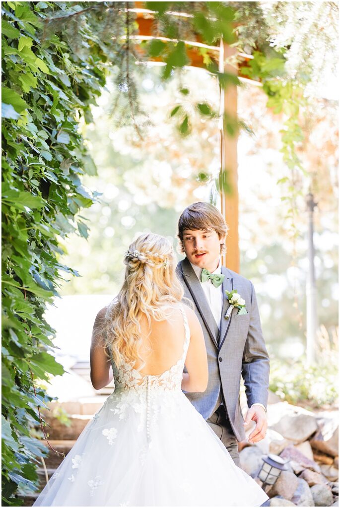 grooms first look of his bride in Boise idaho