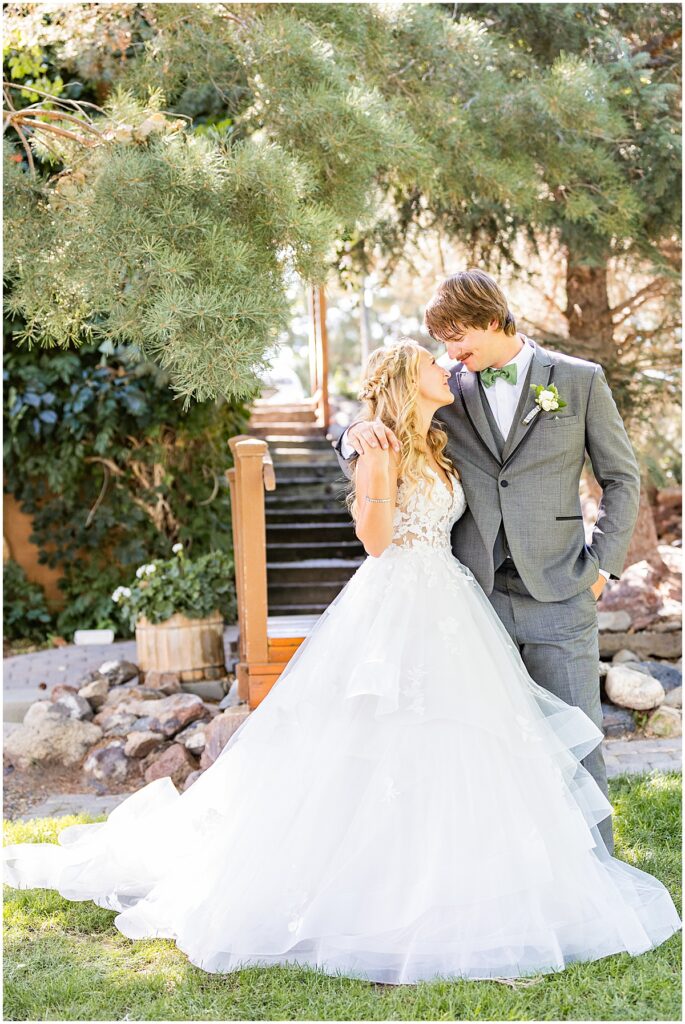 bride and groom posing for wedding portraits in Boise idaho