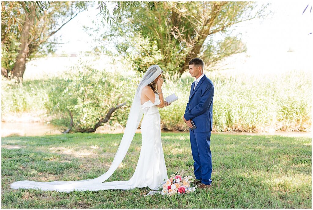 groom and bride sharing private vows